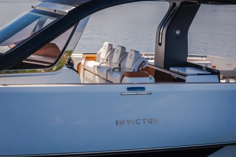 Slide: The Image of Luxury Invictus TT430 yacht interior, 2025 model, featuring sleek design and comfortable seating. - 96