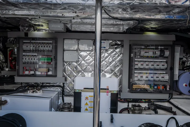 Slide: The Image of Electrical control panel inside 2025 Invictus TT430 yacht, showcasing advanced wiring and components. - 88