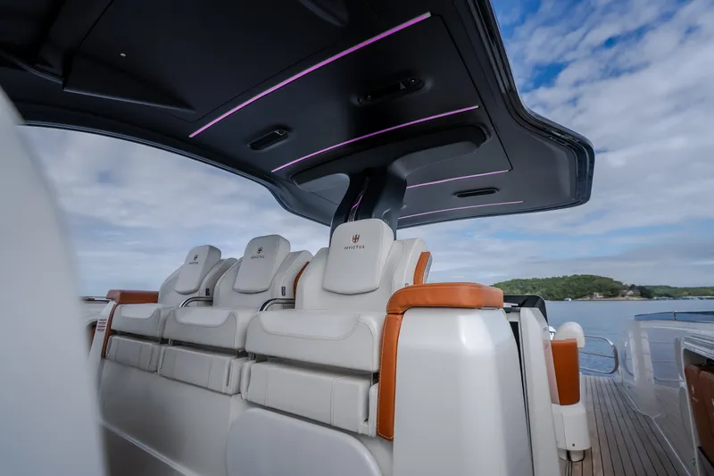 Slide: The Image of Luxurious seating on the 2025 Invictus TT430 yacht with sleek design and scenic ocean view. - 49