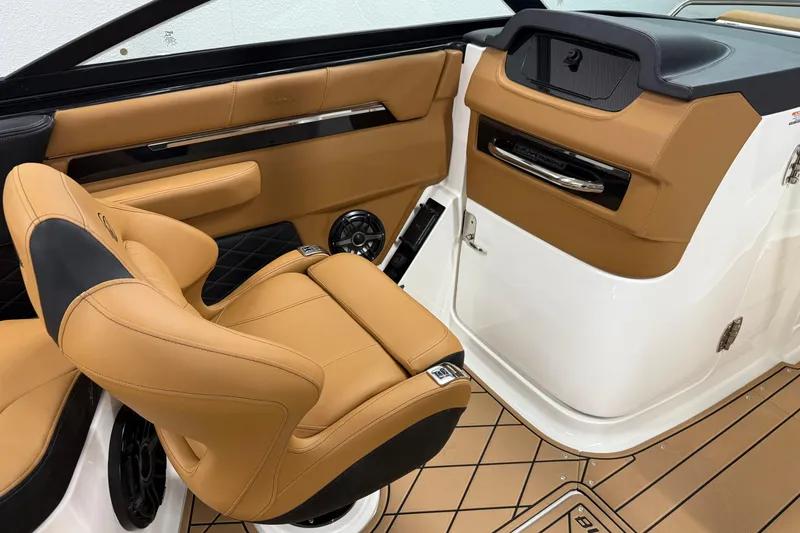 Slide: The Image of Luxurious interior of 2026 Chaparral SSX 6 boat with tan leather seating. - 12