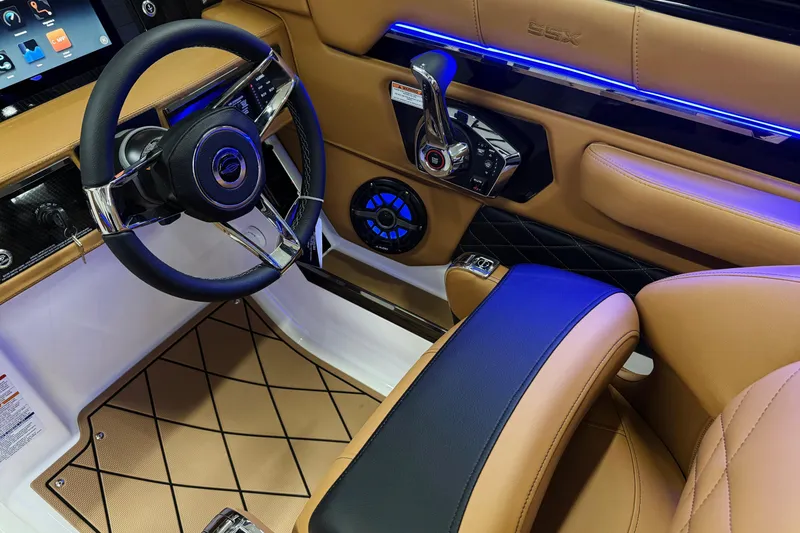 Slide: The Image of 2026 Chaparral SSX 6 interior with luxury steering wheel and modern controls. - 38