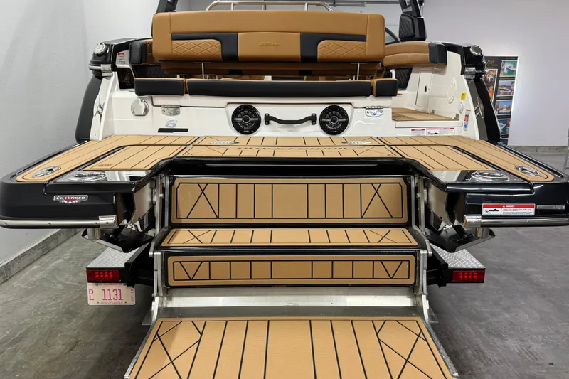 Slide: The Image of 2026 Chaparral SSX 6 boat with extended swim platform and luxurious seating. - 4