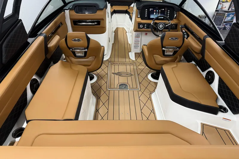 Slide: The Image of Luxurious interior of 2026 Chaparral SSX 6 boat with tan leather seating and modern dashboard. - 5