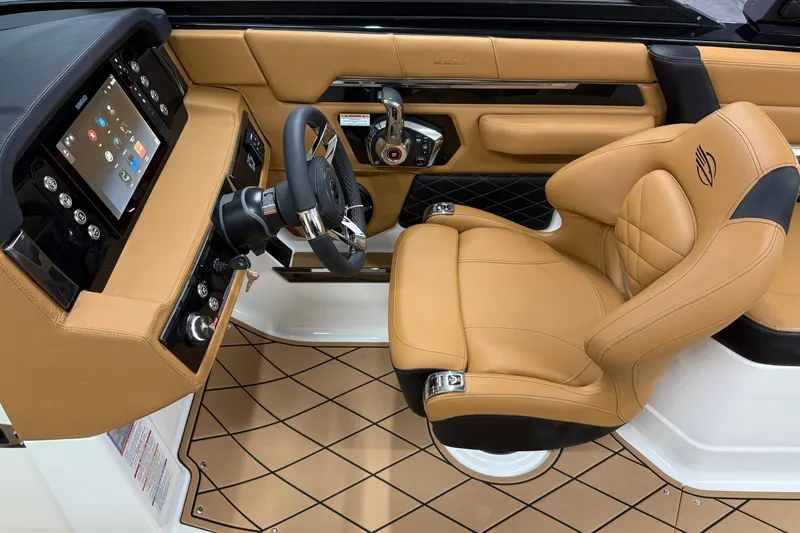 Slide: The Image of Luxurious 2026 Chaparral SSX 6 boat interior with tan leather seating and modern dashboard. - 8