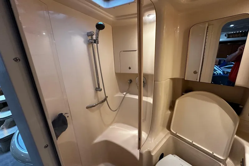 Slide: The Image of Bathroom interior of 2001 Sea Ray 380 Sundancer yacht with shower and toilet. - 25