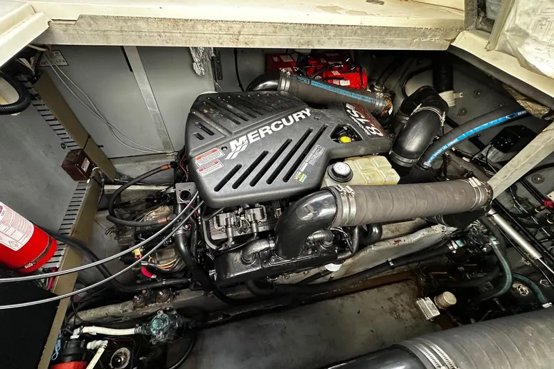Slide: The Image of Engine compartment of a 2001 Sea Ray 380 Sundancer with Mercury engine. - 39