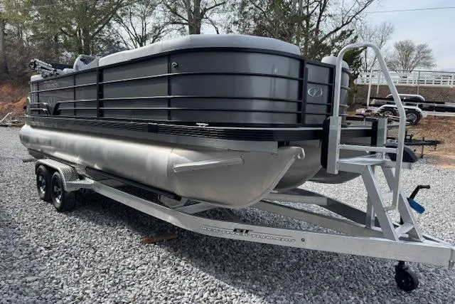 The Image of 2026 Veranda VISTA VIEW 22RC pontoon boat on trailer, parked on gravel. - 1