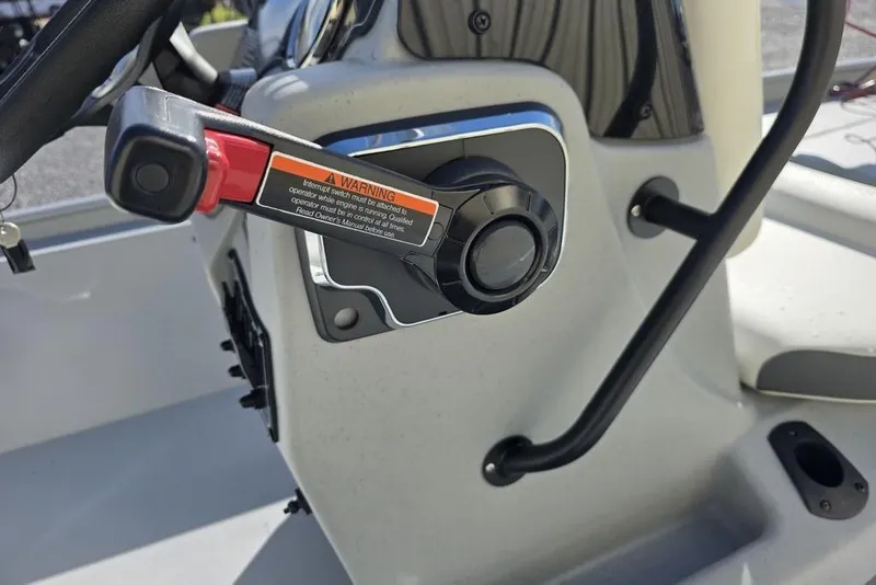 Slide: The Image of Throttle control on 2026 Tracker Bass Tracker Classic CC boat console. - 11