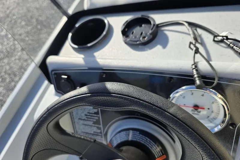 Slide: The Image of Steering wheel and dashboard of 2026 Tracker Bass Tracker Classic CC boat. - 14