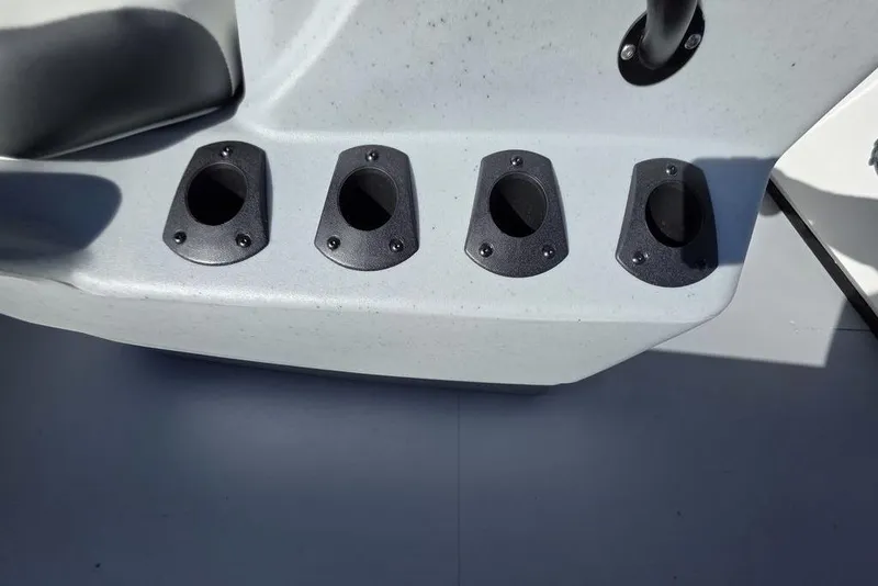 Slide: The Image of Four rod holders on a 2026 Tracker Bass Tracker Classic CC boat. - 16