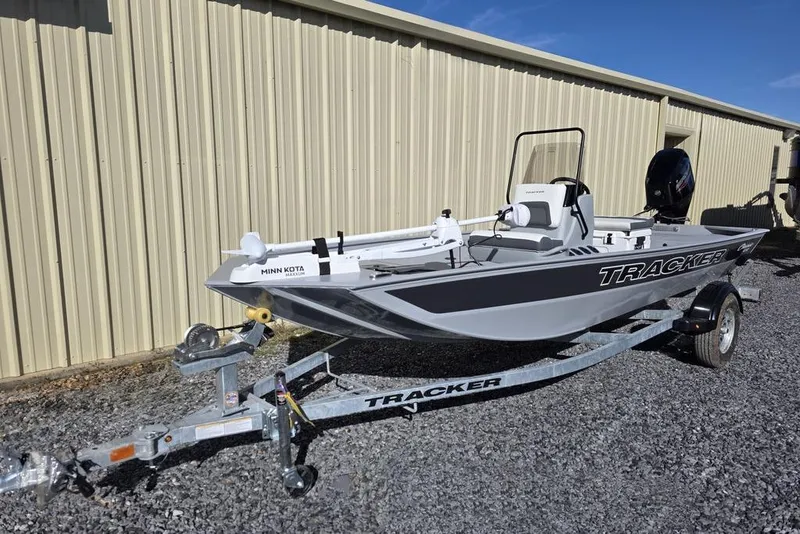 Slide: The Image of 2026 Tracker Bass Tracker Classic CC boat on trailer, parked outdoors. - 6