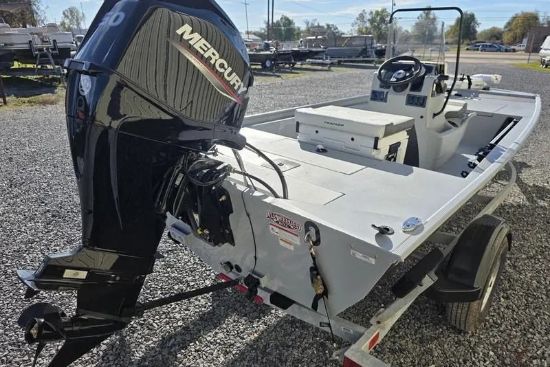 Slide: The Image of 2026 Tracker Bass Tracker Classic CC boat with Mercury outboard engine on trailer. - 7