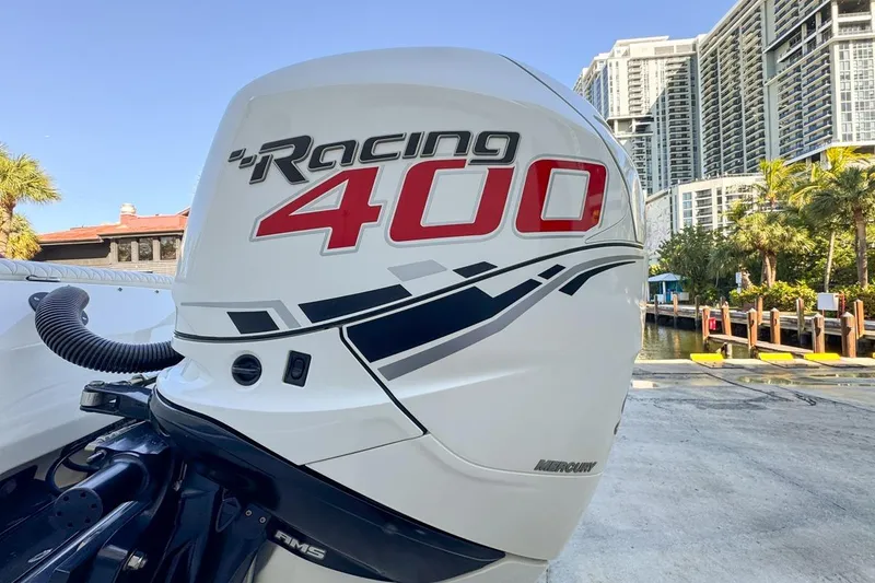 Slide: The Image of Outboard motor on 2022 Velocity 290sc boat, featuring Racing 400 branding. - 111
