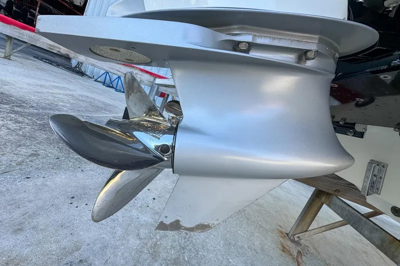 Slide: The Image of 2022 Velocity 290sc boat propeller, close-up view, showcasing sleek metallic design. - 115