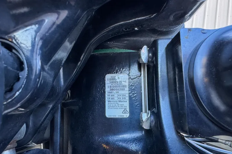 Slide: The Image of Close-up of a 2022 Velocity 290sc engine label with specifications. - 117