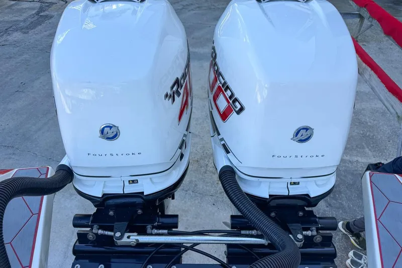 Slide: The Image of Twin Mercury Racing outboard engines on a 2022 Velocity 290sc boat. - 21