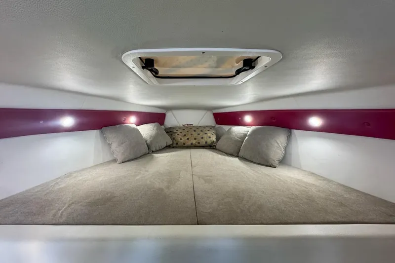 Slide: The Image of Cozy interior cabin of 2022 Velocity 290sc with cushions and ambient lighting. - 63