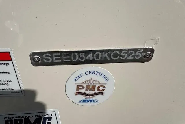 Slide: The Image of 2025 Sea Chaser 24 HFC boat with PMC certification and identification plate. - 7
