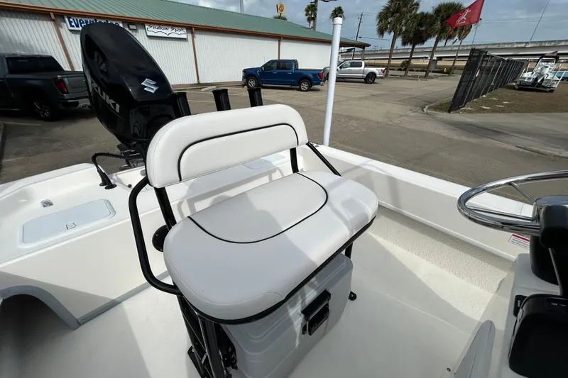 Slide: The Image of 2026 Sundance B20CCR boat with Suzuki engine, featuring a white cushioned seat. - 15