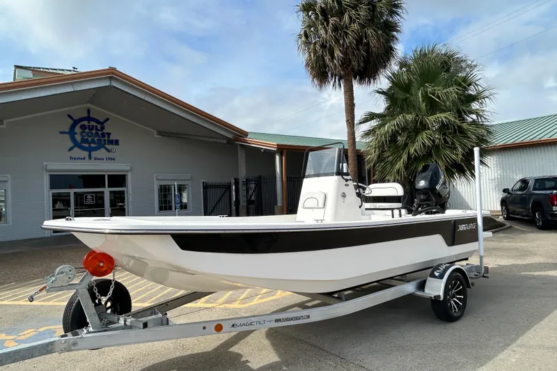 Slide: The Image of 2026 Sundance B20CCR boat on trailer at Gulf Coast Marine dealership. - 2