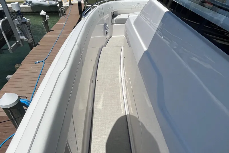 Slide: The Image of Display screen showing fuel usage and trip data for 2024 Regal 33 SAV boat. - 26