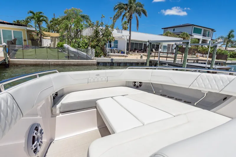 Slide: The Image of 2024 Regal 33 SAV boat interior with spacious seating and modern design. - 31