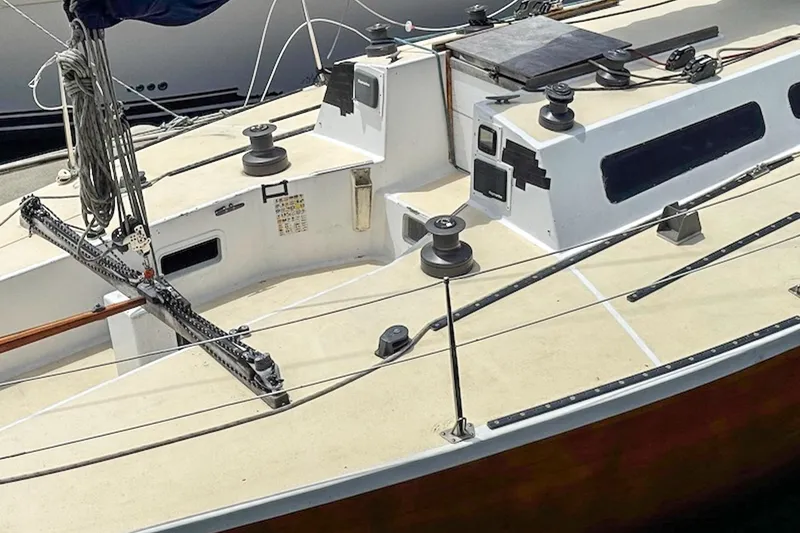 Slide: The Image of 1983 Nelson Marek 36 sailboat deck with winches and rigging. - 5