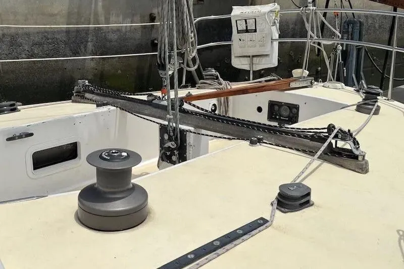 Slide: The Image of 1983 Nelson Marek 36 sailboat deck with winches and rigging. - 6