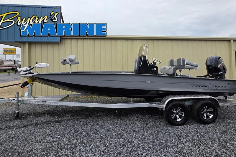 The Image of 2025 Xpress H22B Bay boat on trailer at Bryan's Marine dealership. - 1