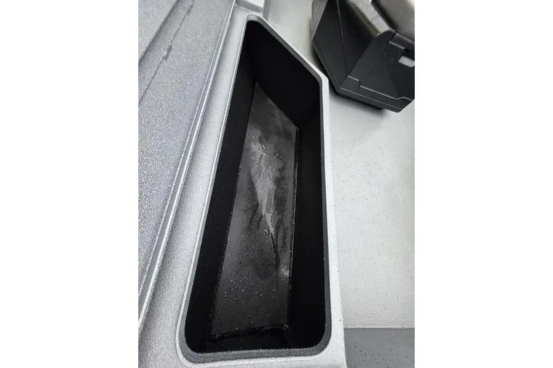 Slide: The Image of Storage compartment of 2025 Xpress H22B Bay boat, featuring sleek interior design. - 21