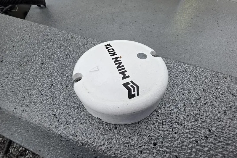 Slide: The Image of White Minn Kota cap on Xpress H22B Bay boat, 2025 model. - 24