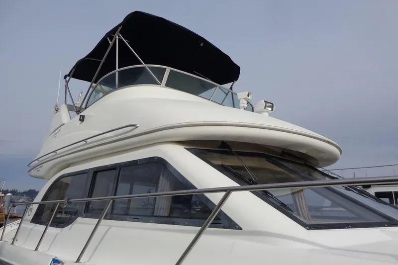 Slide: The Image of 2001 Bayliner 3488 Command Bridge Motoryacht with sleek design and spacious command bridge. - 17