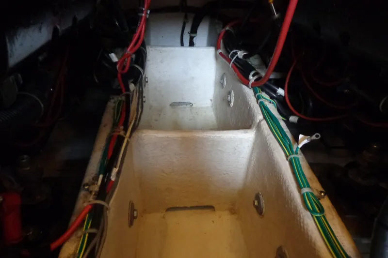 Slide: The Image of Engine compartment of 2001 Bayliner 3488 Command Bridge Motoryacht with visible wiring. - 25