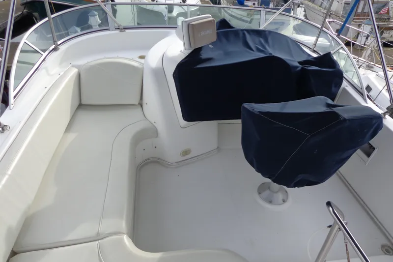 Slide: The Image of 2001 Bayliner 3488 Command Bridge Motoryacht cockpit with covered seating and helm. - 30