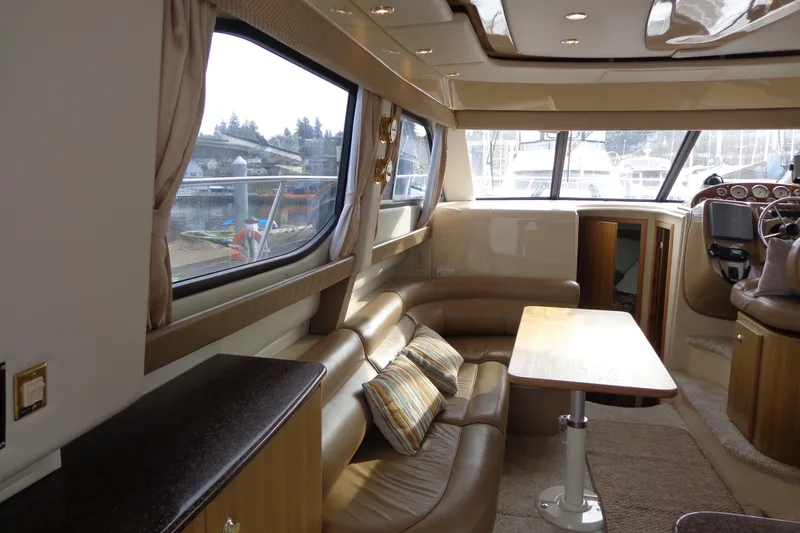 Slide: The Image of Interior of 2001 Bayliner 3488 Command Bridge Motoryacht with leather seating and helm. - 37