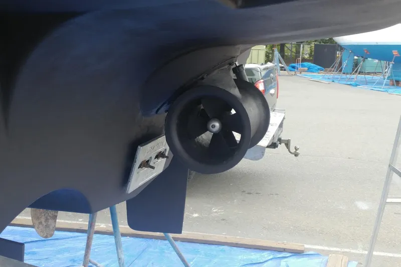 Slide: The Image of 2001 Bayliner 3488 Command Bridge Motoryacht docked on calm water. - 4