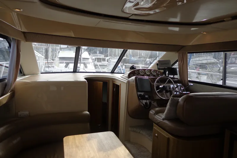 Slide: The Image of Interior of 2001 Bayliner 3488 Command Bridge Motoryacht with helm and seating area. - 43
