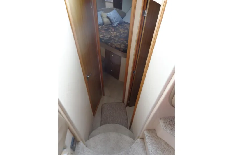 Slide: The Image of Interior view of 2001 Bayliner 3488 Command Bridge Motoryacht cabin hallway. - 44