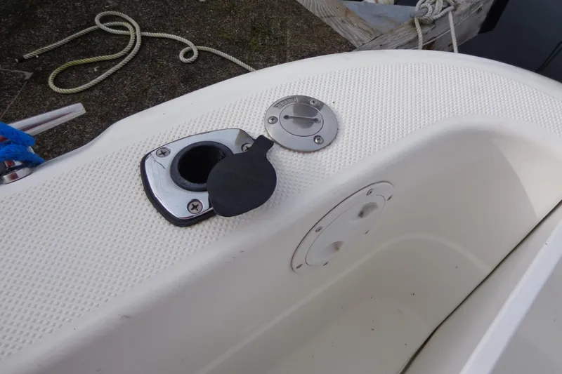 Slide: The Image of 2001 Bayliner 3488 Command Bridge Motoryacht fuel cap and deck detail. - 56