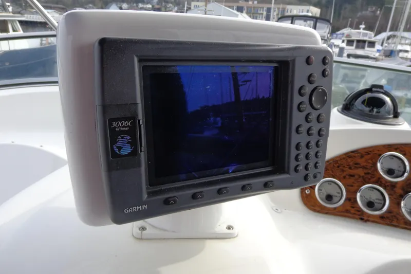 Slide: The Image of Garmin GPS on 2001 Bayliner 3488 Command Bridge Motoryacht dashboard. - 61
