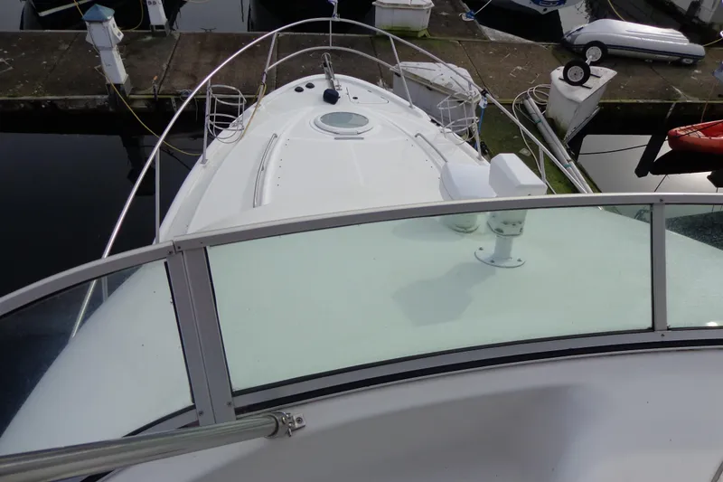 Slide: The Image of 2001 Bayliner 3488 Command Bridge Motoryacht docked at marina, view from bridge. - 64