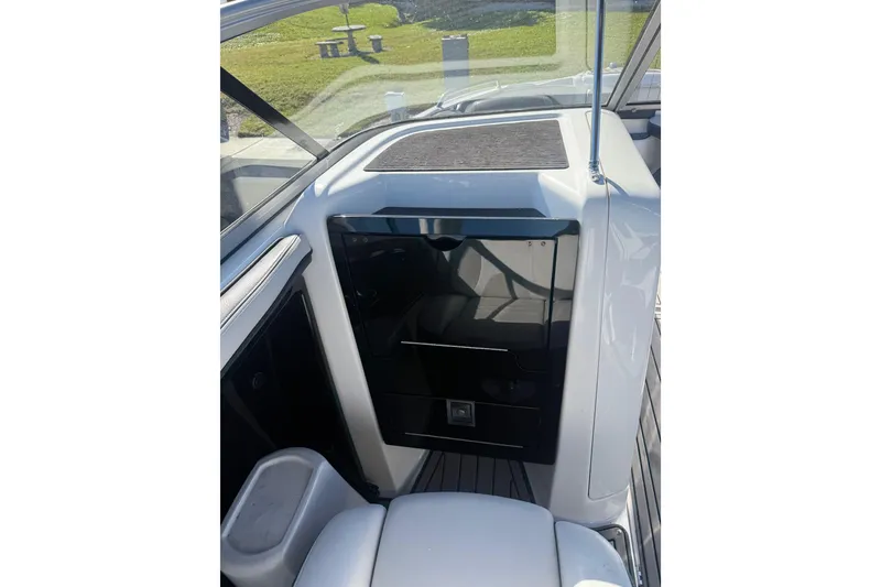 Slide: The Image of 2017 Yamaha Boats 242 Limited S E-Series interior with sleek design and modern features. - 11