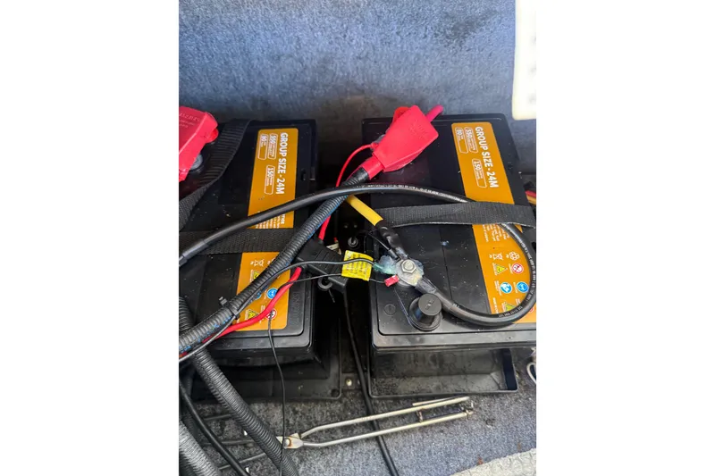 Slide: The Image of Batteries in a 2017 Yamaha Boats 242 Limited S E-Series, connected with cables. - 13
