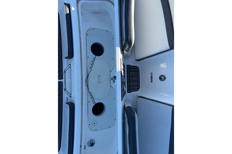 Slide: The Image of 2017 Yamaha Boats 242 Limited S E-Series interior detail, featuring seating and storage compartments. - 15