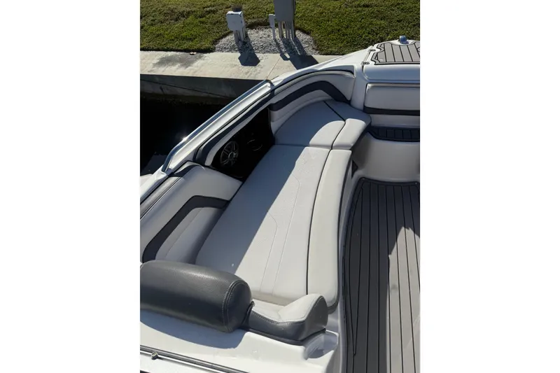 Slide: The Image of 2017 Yamaha Boats 242 Limited S E-Series interior seating with sleek design and comfortable upholstery. - 18