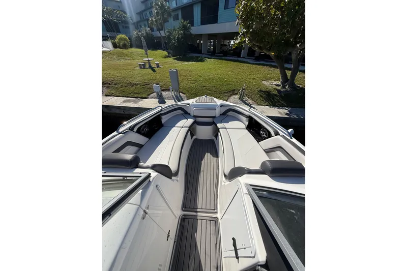 Slide: The Image of 2017 Yamaha Boats 242 Limited S E-Series interior with sleek seating and modern design. - 19