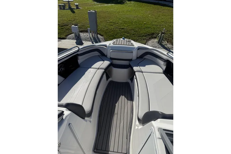 Slide: The Image of 2017 Yamaha Boats 242 Limited S E-Series interior with sleek seating and modern design. - 20