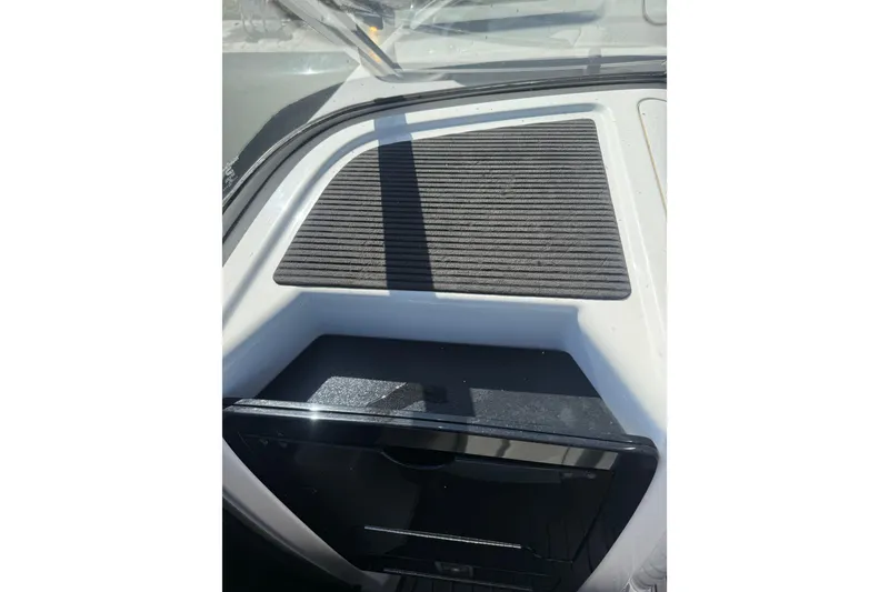 Slide: The Image of 2017 Yamaha Boats 242 Limited S E-Series dashboard with textured surface detail. - 24