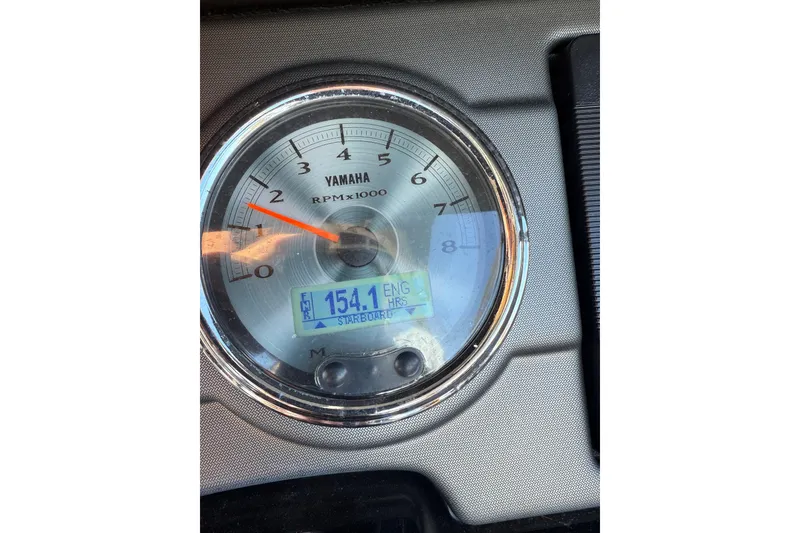 Slide: The Image of Close-up of 2017 Yamaha Boats 242 Limited S E-Series tachometer displaying 154.1 engine hours. - 26