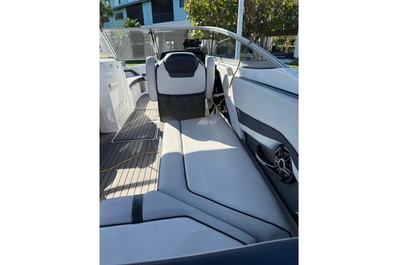 Slide: The Image of 2017 Yamaha Boats 242 Limited S E-Series interior with sleek seating and modern design. - 7